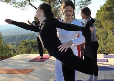 Lord-Shiva-dancers-pose-adjusted-by-Opale-during-Yoga-retreat-in-Ibiza