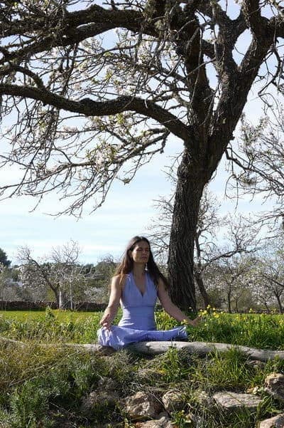 Opale-in-Meditation-below-a-tree-in-Ibiza-400x601