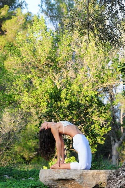 Opale-in-ustrasana-Camel-pose-by-olive-tree-Vinyasa-YogaIbiza-1-400x601
