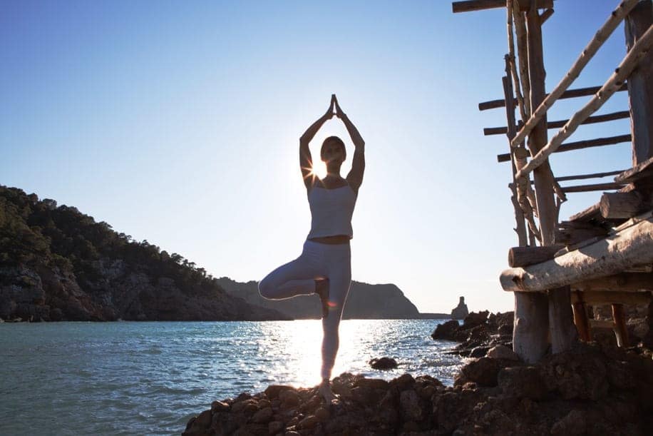 casaiaromatiques-copier Opale-in-Vrkasana-Tree-pose-Yoga-at-Beniras-beach-in-Ibiza-